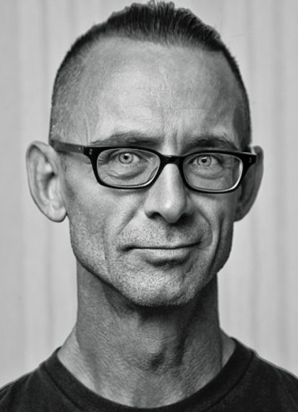 Black and white headshot of Chuck Palahniuk